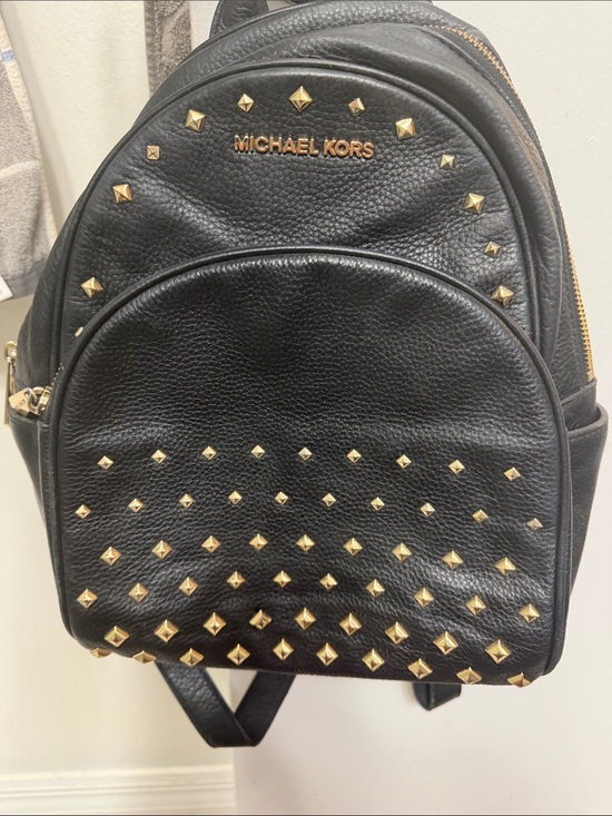 Michael Kors Handbags - Michael Kors Black Pebbled Leather Mini Backpack with Gold Stud Accents